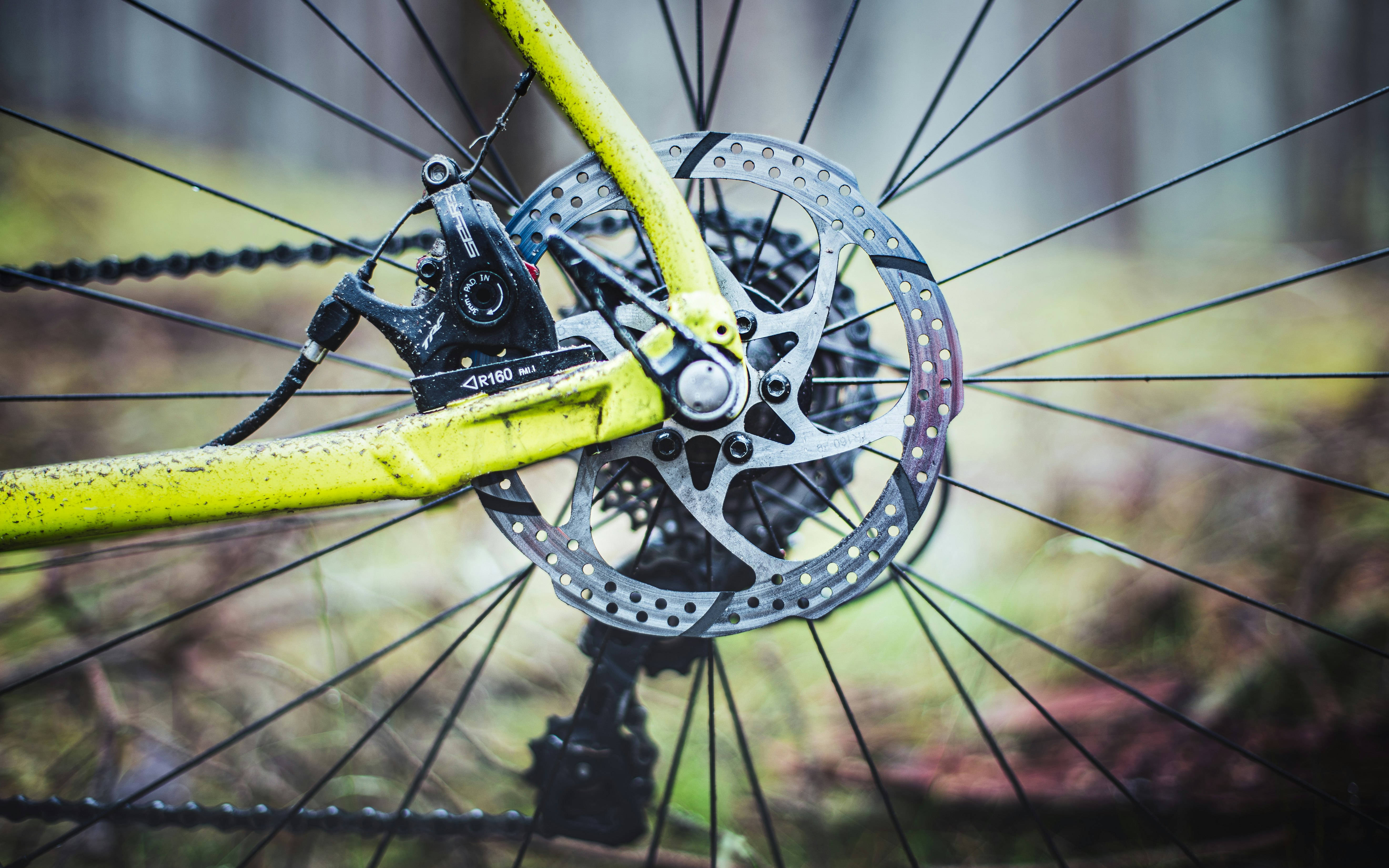 yellow bicycle wheel with tire